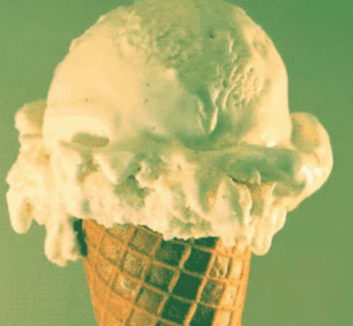two scoops of ice cream on a blue cone
