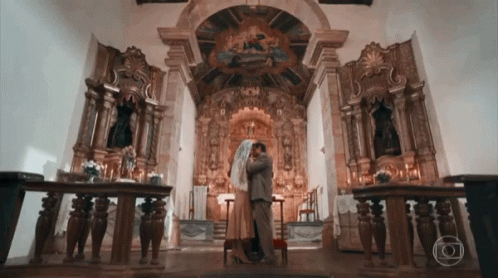 there is a couple in the church holding each other