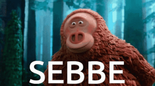 a blue gorilla sitting in a forest next to the words sebe