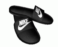 nike slippers are in the shape of an open pair