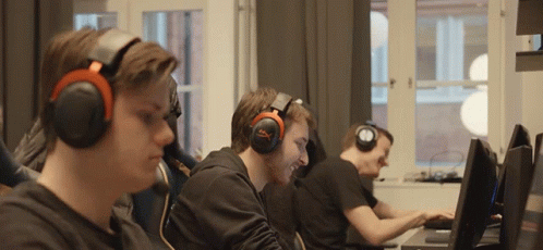four people wearing headphones on their ears