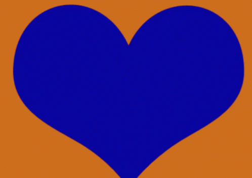 a red heart is drawn on a blue background