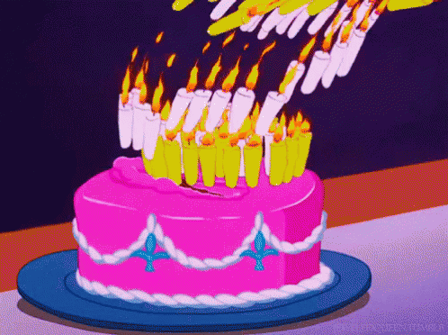there is a cake that is purple with many candles