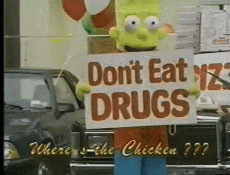 a large sign with words that say don't eat iz  while other cars wait