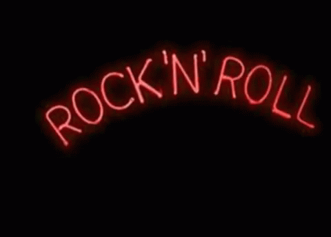 the word rock n roll is shown in blue neon