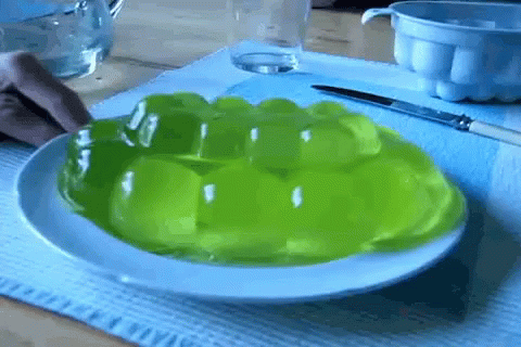 there is green cake on the plate
