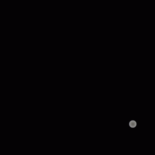 the moon seen through a telescope lens