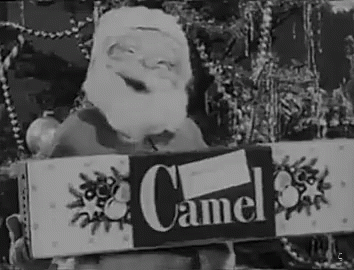 an old fashioned po of a santa claus with a game sign