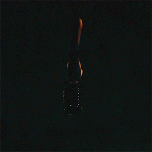 a dark colored image of a cell phone with the dark background