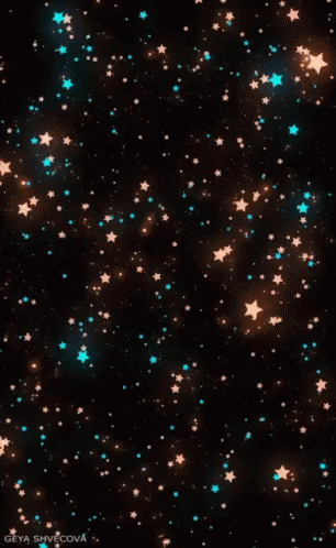 a cluster of small stars, mostly yellow and blue