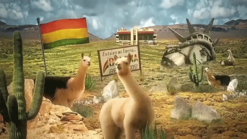 llamas in an arid landscape holding flags, sign and statue