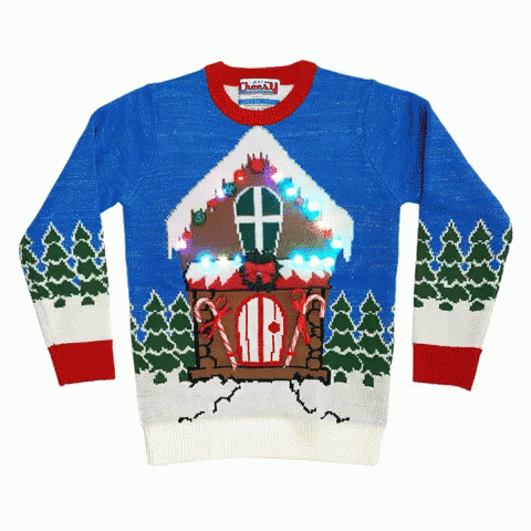 the ugly sweater has an illuminated house and trees on it