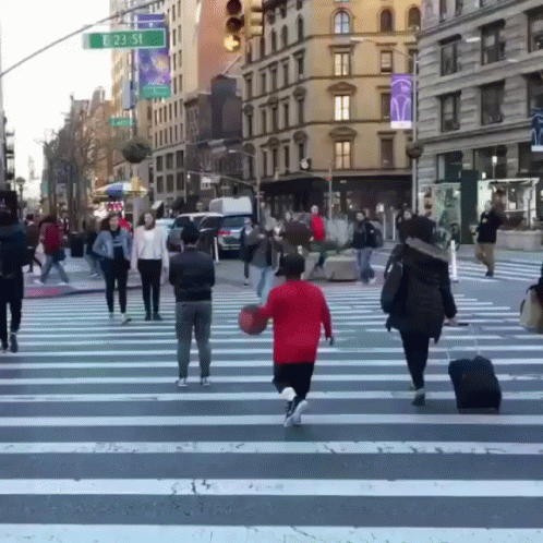 the people in the city are cross the street