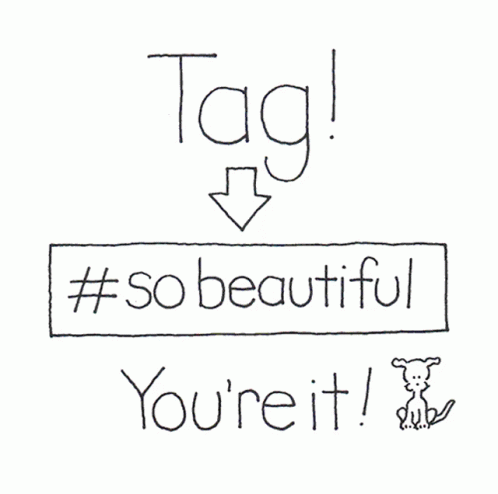 a handwritten sign is shown with two arrows pointing to the words tag and so beautiful you're it