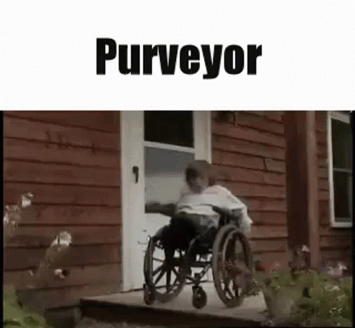 a boy in a wheelchair at the door