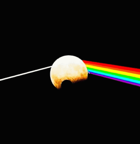 a rainbow - colored object with a string attached to it