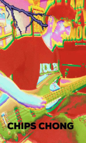 a man is playing the guitar in the colorful po