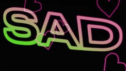 the word sad is in bright neon purple