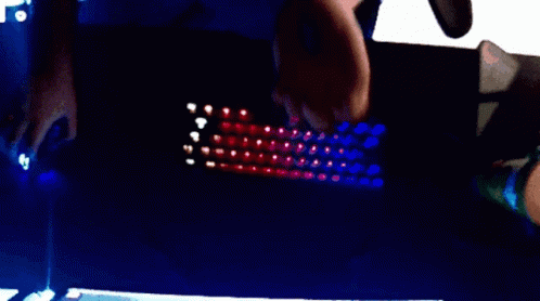 someone using a laptop that looks like an image of the backlit keyboard