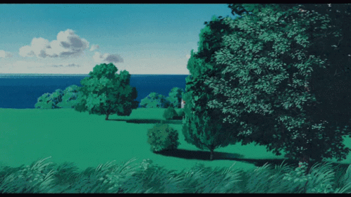 landscape with lush green grass and blue sky