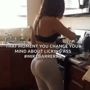 a woman in a kitchen cooking with the words, that moment you change your mind about liking ass
