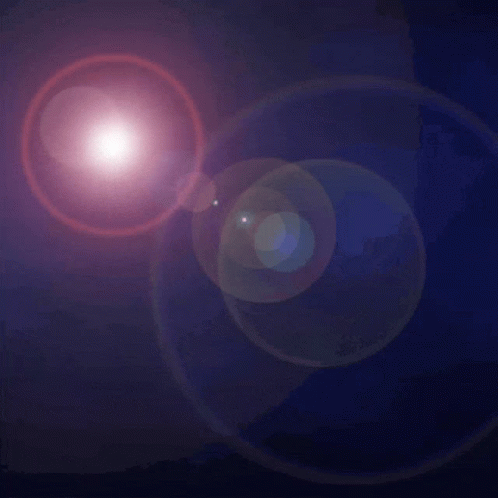 two large orbs shine brightly on top of the image