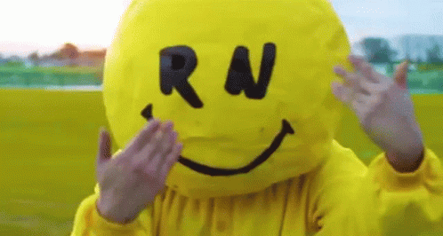 a child in a costume that has an odd face