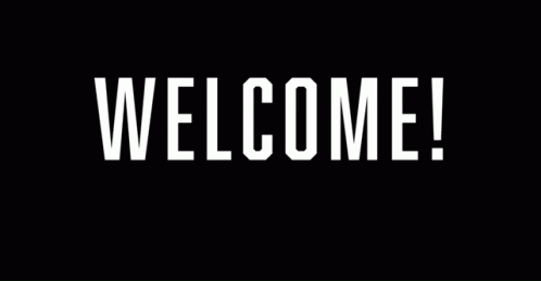 a black and white sign reads welcome