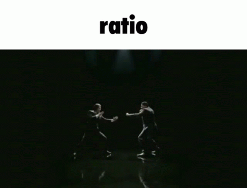 two people are dancing with each other in the dark