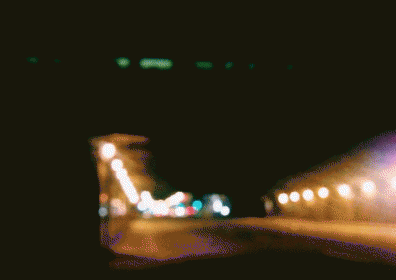 blurred image of a highway with cars in motion