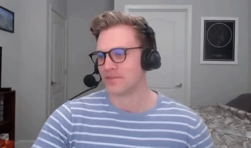 a person with headphones and glasses on their faces
