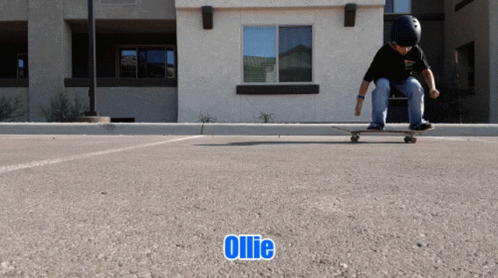 a little  riding a skate board on a parking lot