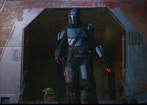 an image of the star wars character standing in a doorway