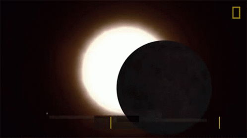 the moon is near an object in the dark sky