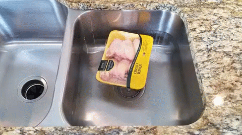 a soap bar and a dish drying in a sink