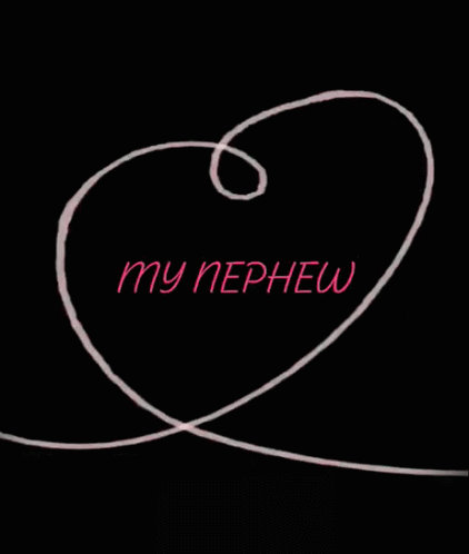 a close up of the words my nephw in the shape of a heart