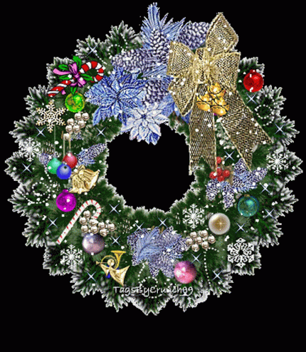 a beautiful christmas wreath with many colorful ornaments