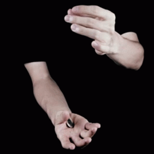 two hands with white hands holding each other