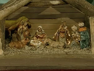 a nativity scene with three wise men and a baby jesus