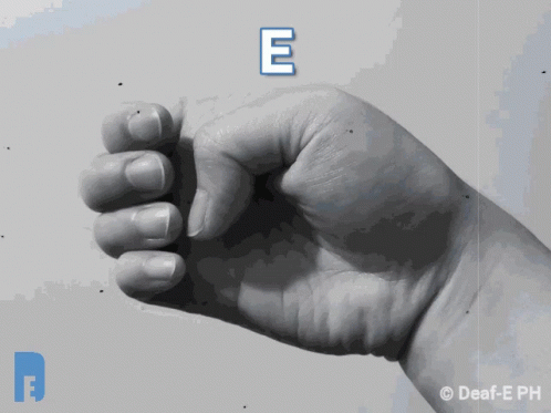 a fist is pointed upwards to the camera