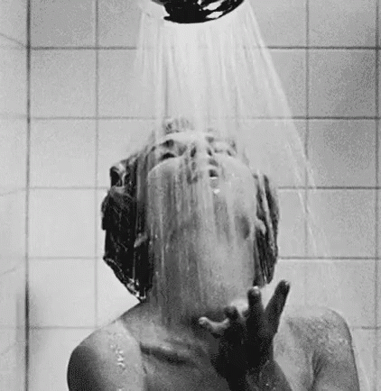 an image of the head of a child in a shower