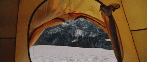 a tent that is blue in the snow