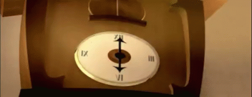 a very close up view of a small clock
