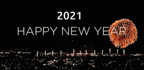 a happy new year text is shown in the dark sky