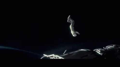 a person jumping up in the air at night