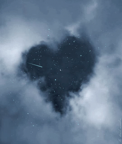 the cloud in the shape of a heart is flying toward a shooting star