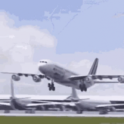 a commercial airplane taking off from an airport runway
