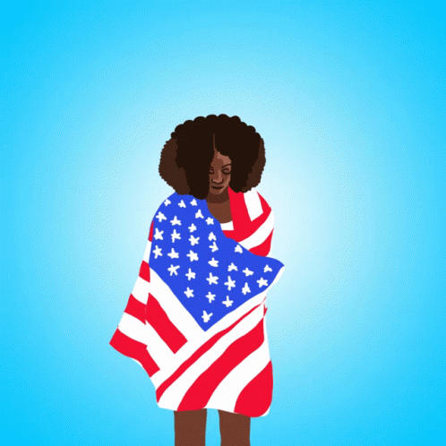 a woman wrapped in an american flag is talking on the phone