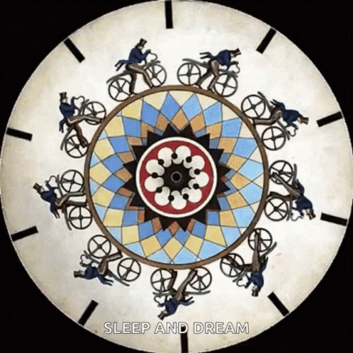 the picture shows people on their bicycles in a circular pattern