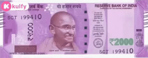 the pink indian paper bill has an image of india